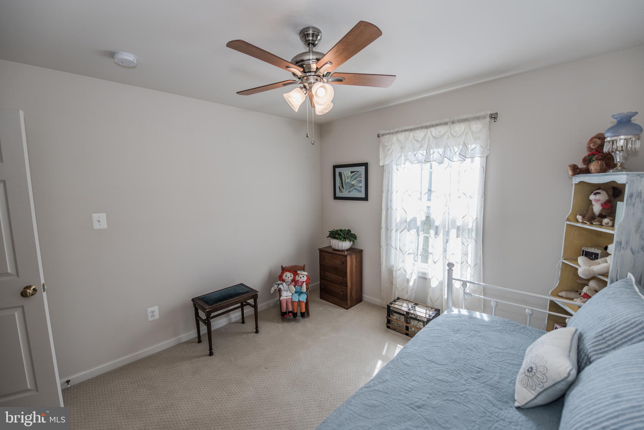 108 Eagle Drive Cross Junction, VA 22625 - Photo 14 of 39 a living room with furniture and a window