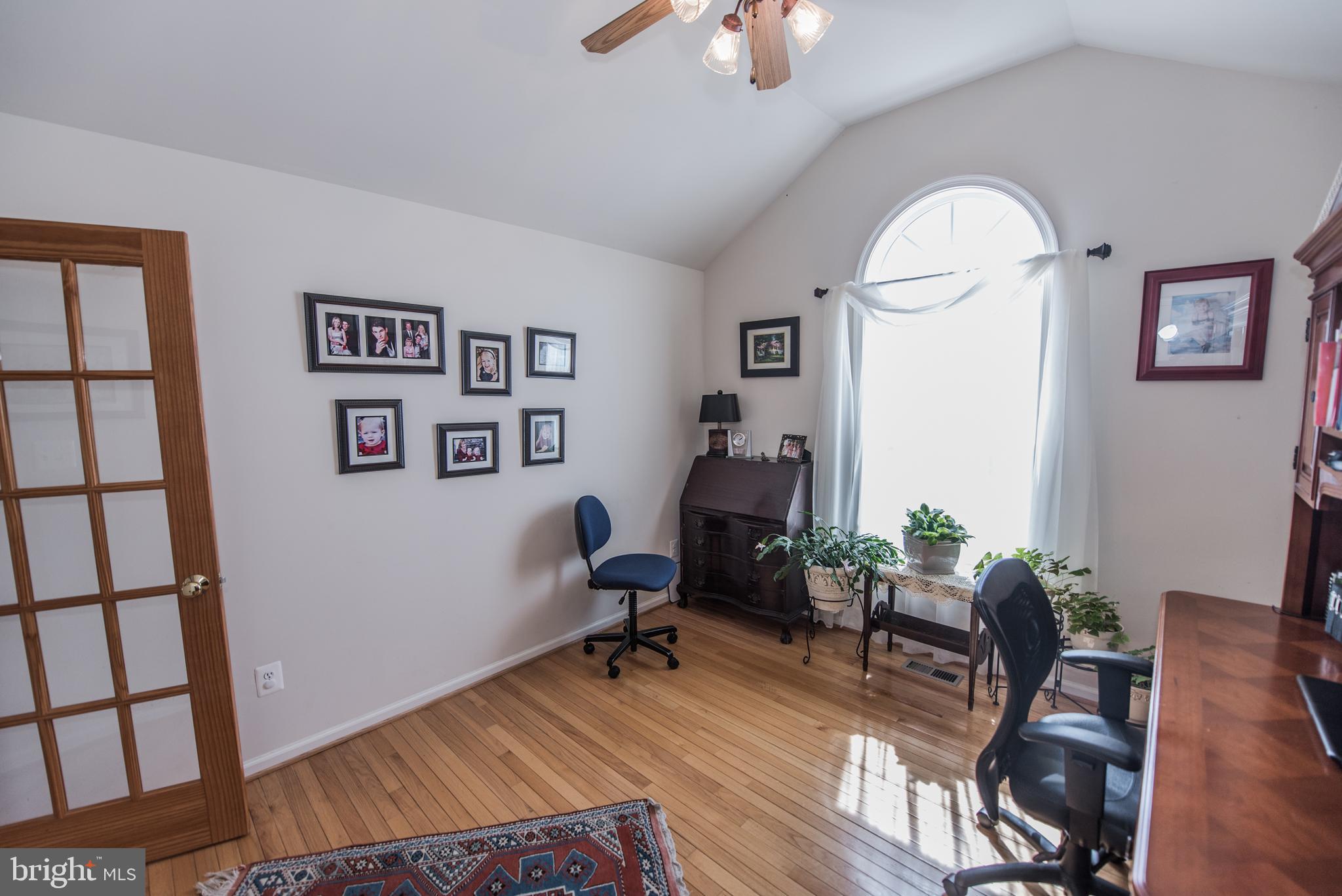 108 Eagle Drive Cross Junction, VA 22625 - Photo 16 of 39 a view of a workspace room with wooden floor windows cabinet