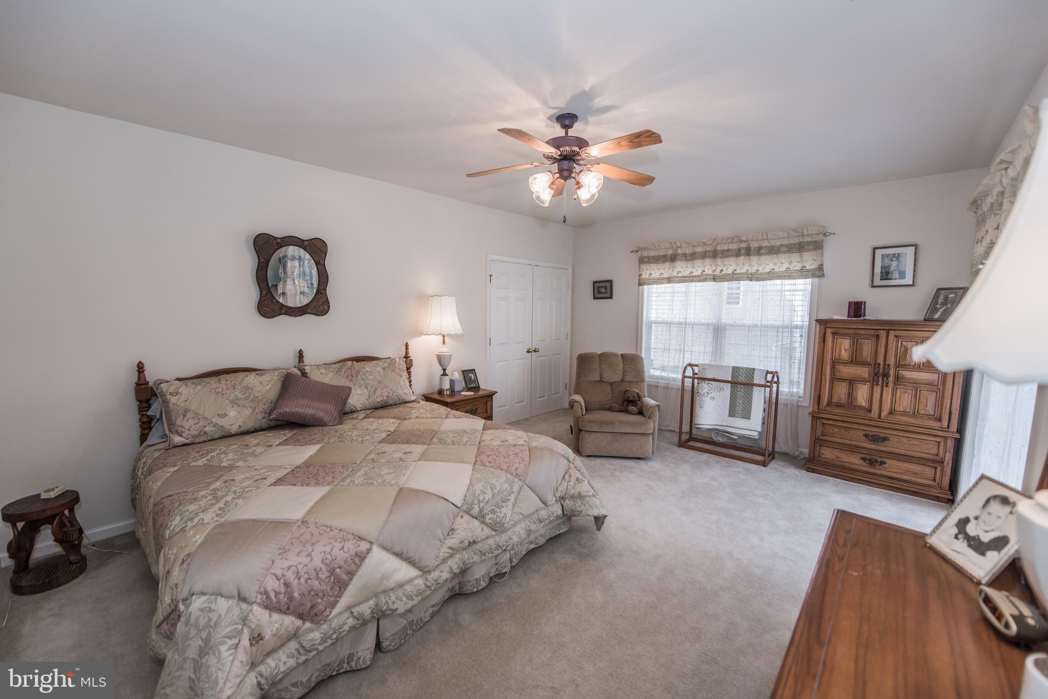 108 Eagle Drive Cross Junction, VA 22625 - Photo 21 of 39 a bedroom with a bed furniture and a window