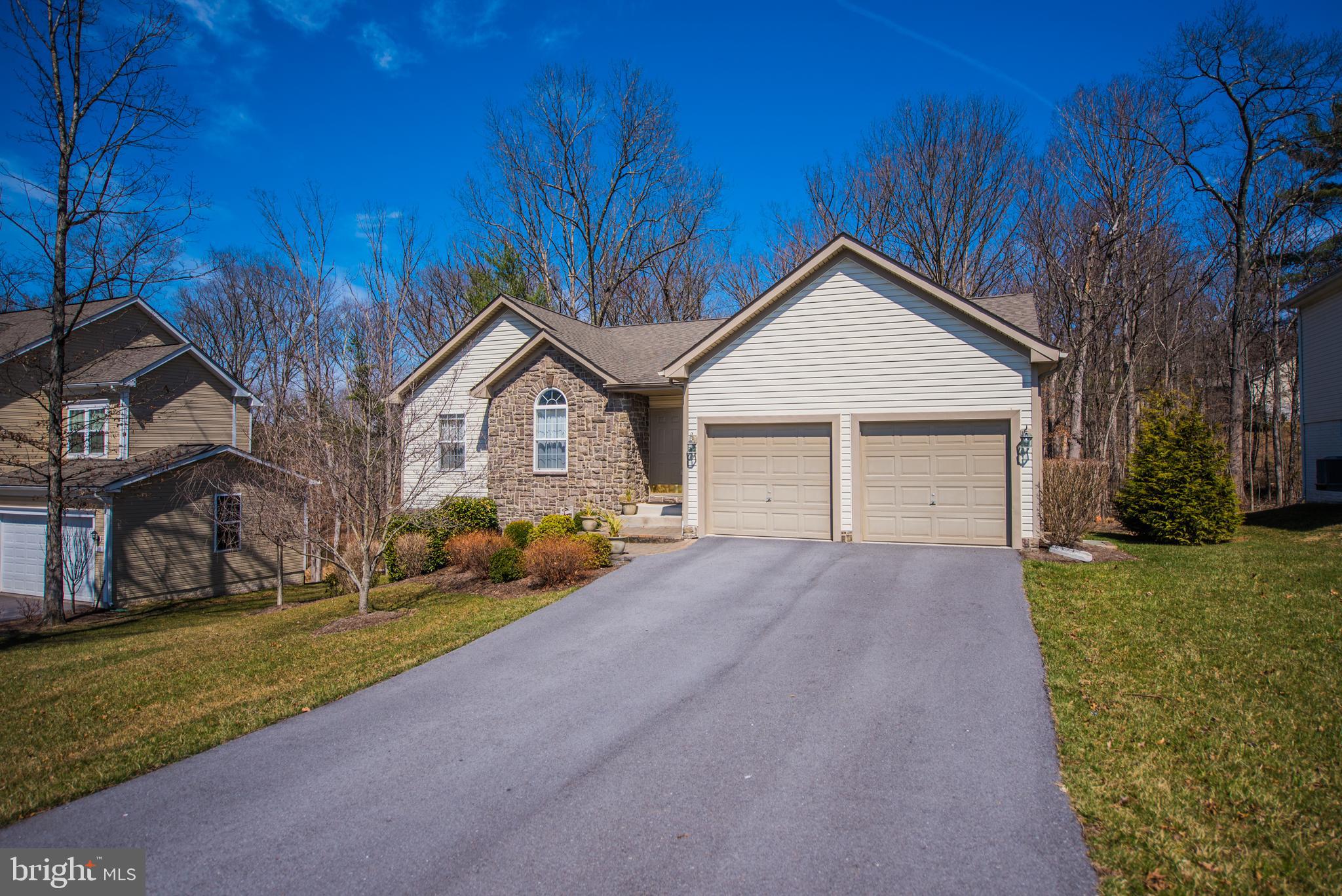 108 Eagle Drive Cross Junction, VA 22625 - Photo 29 of 39 a front view of a house with garden