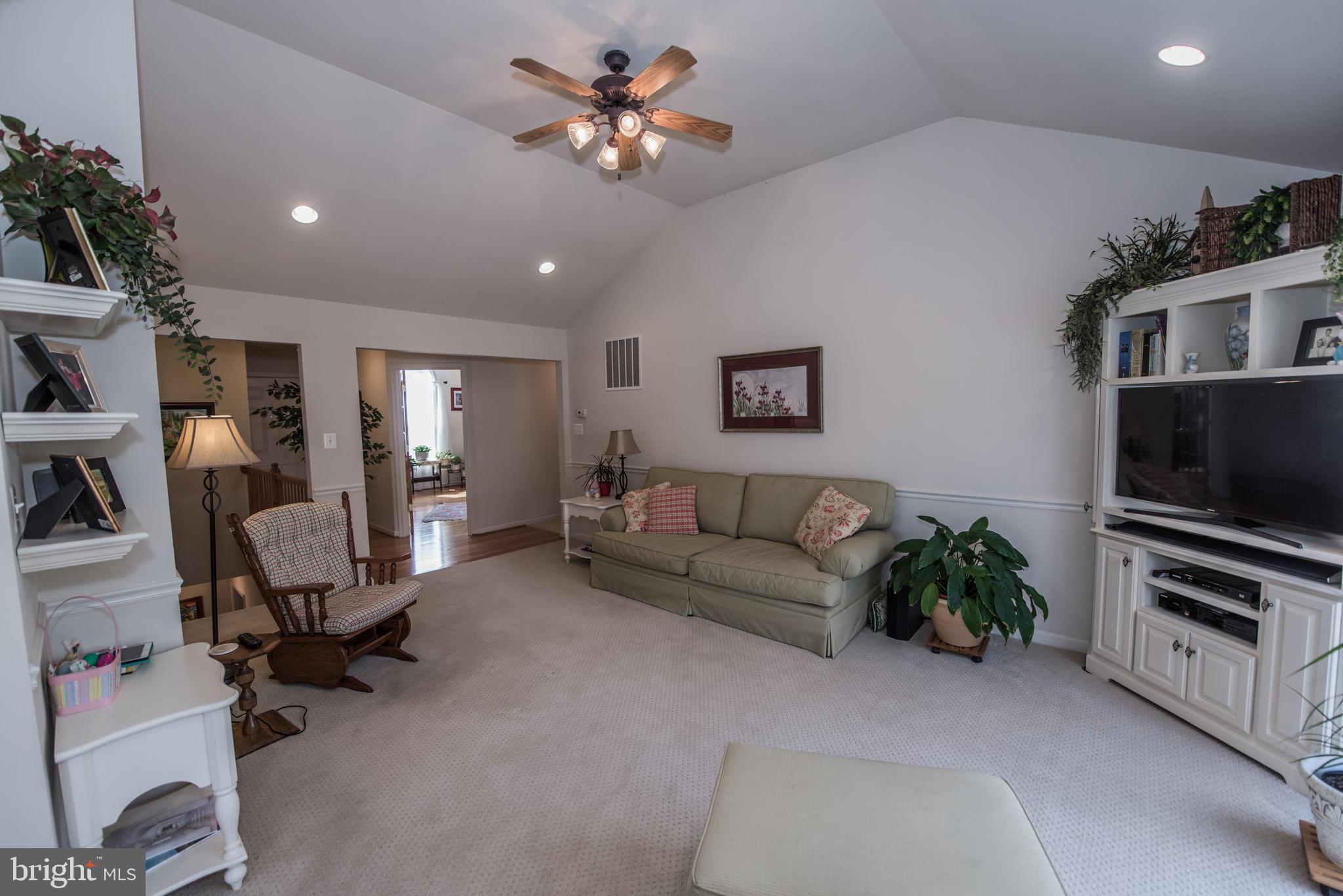 108 Eagle Drive Cross Junction, VA 22625 - Photo 30 of 39 a living room with furniture and a flat screen tv