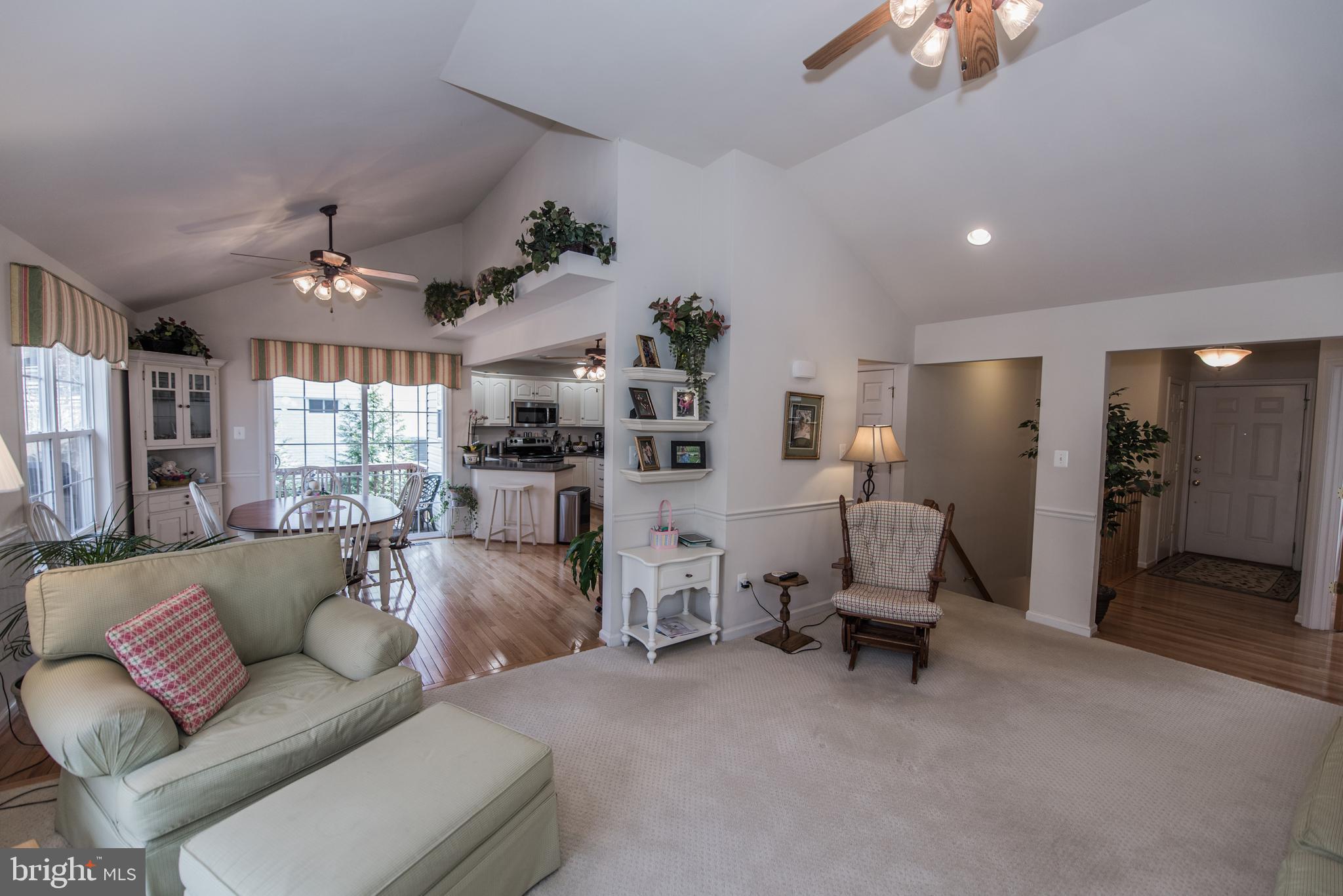 108 Eagle Drive Cross Junction, VA 22625 - Photo 31 of 39 a living room with furniture and a large window