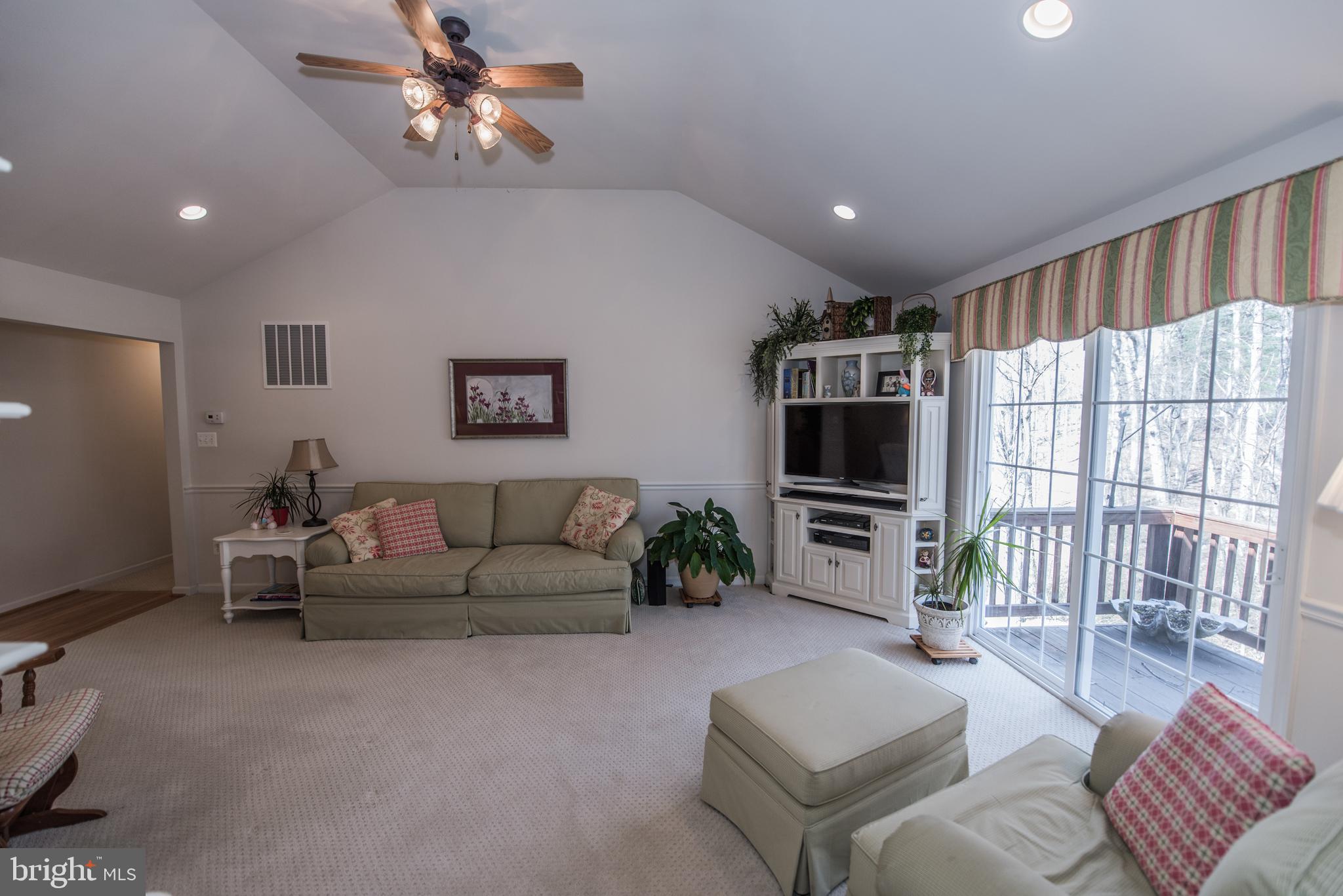 108 Eagle Drive Cross Junction, VA 22625 - Photo 5 of 39 a living room with furniture and a flat screen tv