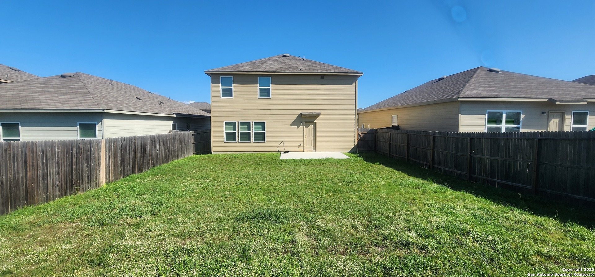 7115 Mesa Cliffs Converse, TX 78109 - Photo 27 of 30 a front view of a house with yard