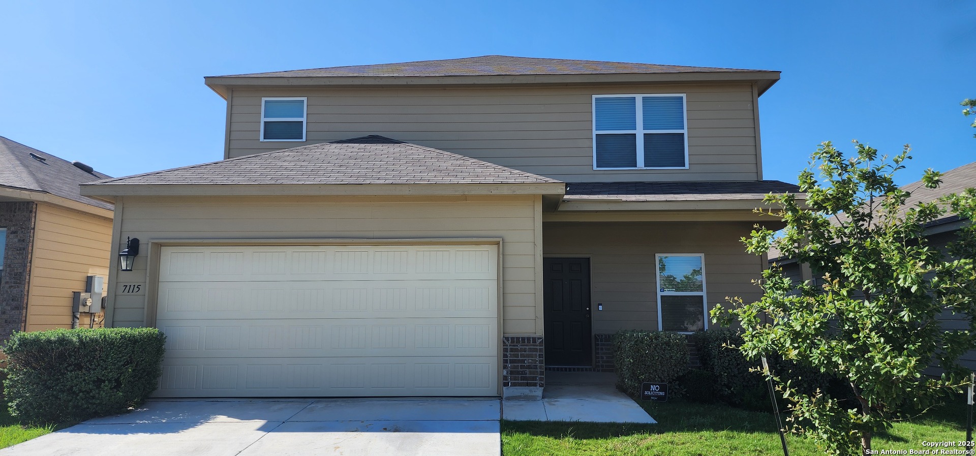 7115 Mesa Cliffs Converse, TX 78109 - Photo 3 of 30 a front view of a house with garden