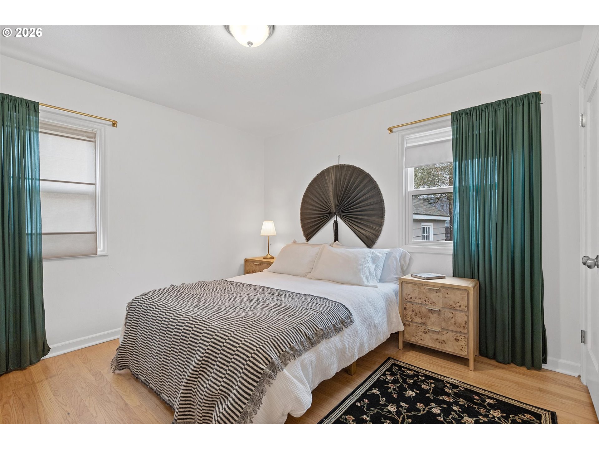 4773 North Yale Street Portland, OR 97203 - Photo 12 of 45 a bedroom with a bed and a window