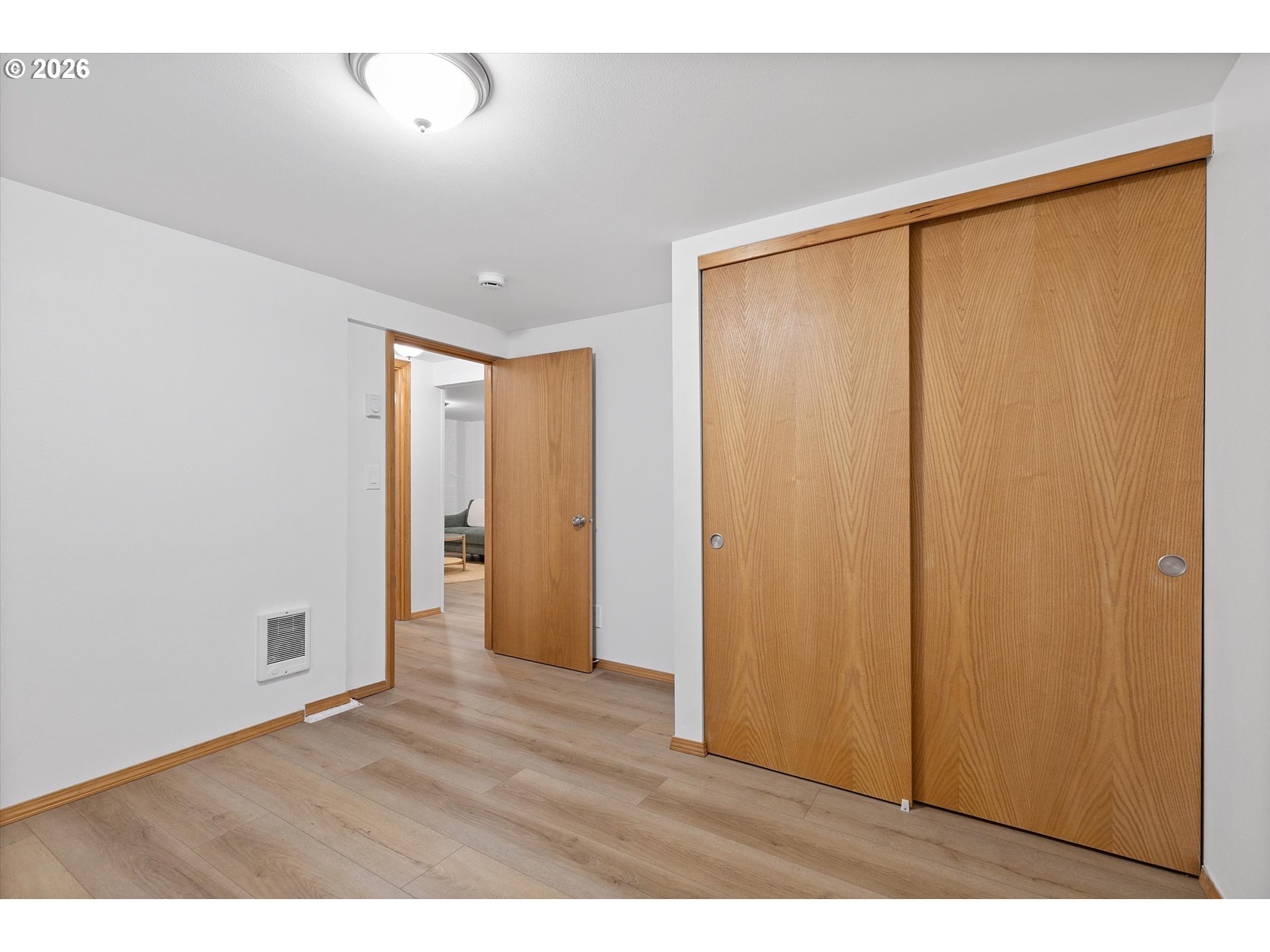 4773 North Yale Street Portland, OR 97203 - Photo 32 of 45 a view of an empty room with wooden floor