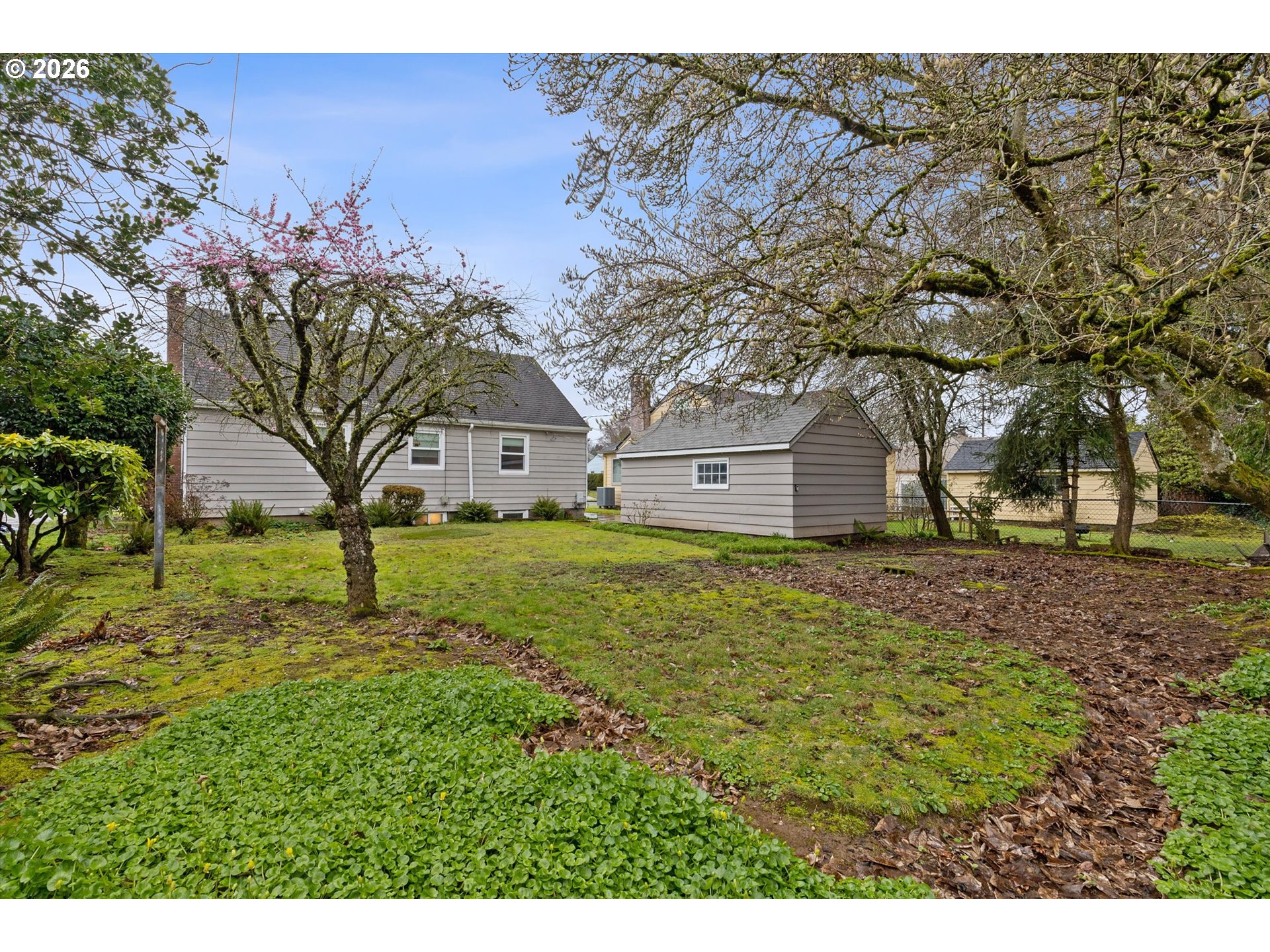 4773 North Yale Street Portland, OR 97203 - Photo 39 of 45 a view of a house with a yard