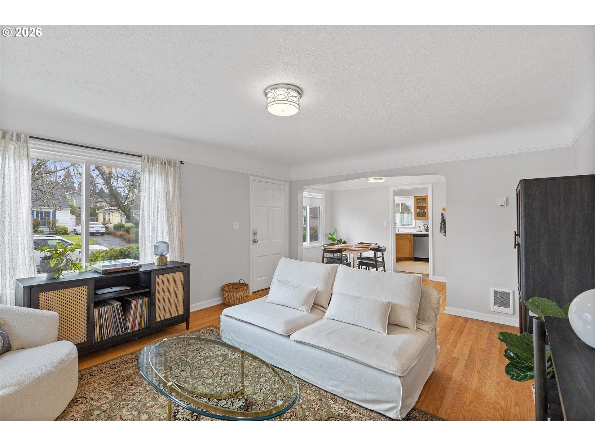 4773 North Yale Street Portland, OR 97203 - Photo 5 of 45 a living room with furniture and a large window