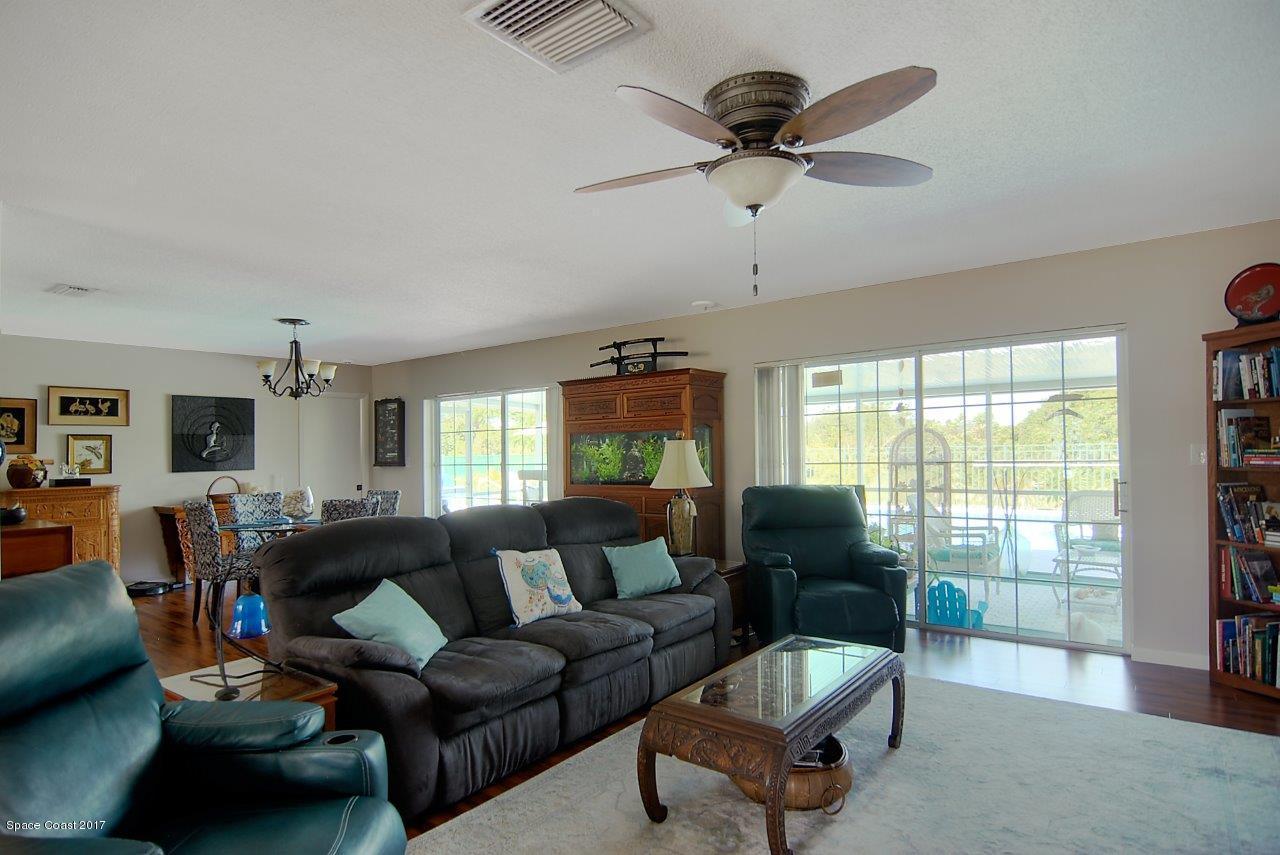 750 Montclair Road Northeast Palm Bay, FL 32905 - Photo 7 of 19 Spacious Family Room