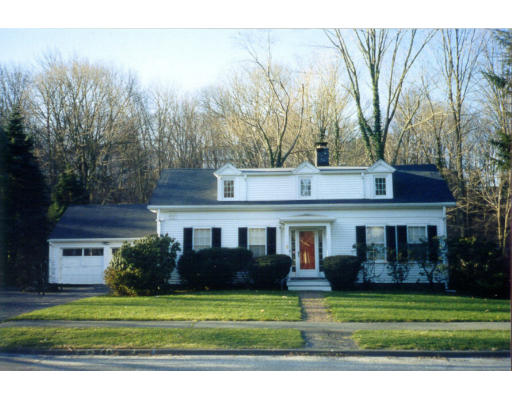5 Grantland Road Wellesley, MA 02481 - Photo 1 of 1 a front view of a house with a garden