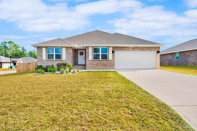 a view of a house with a swimming pool