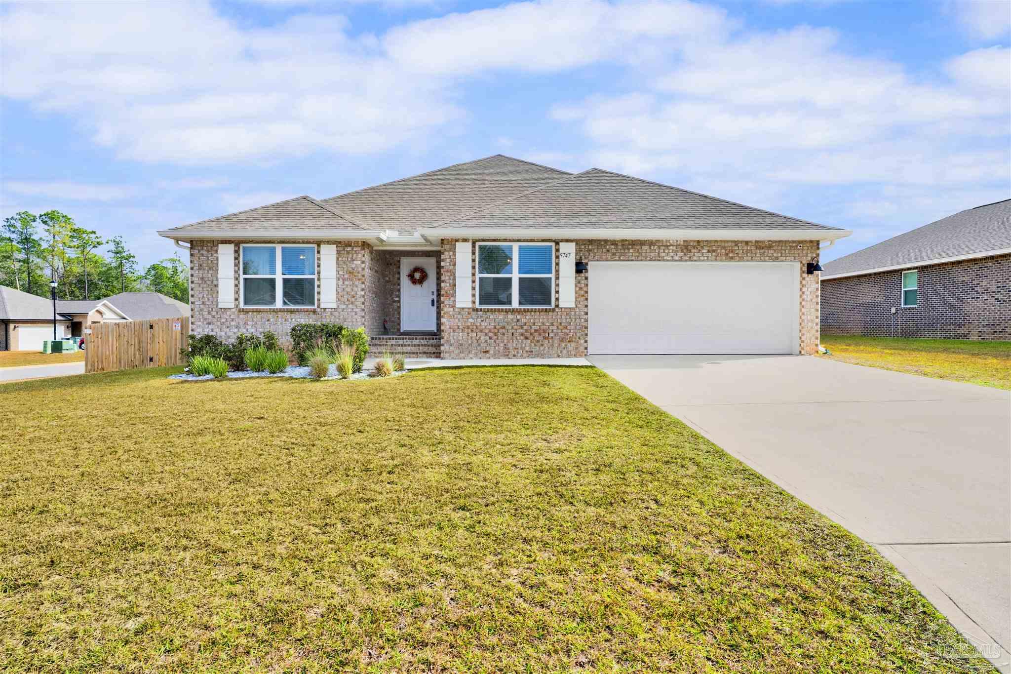 a view of a house with a swimming pool