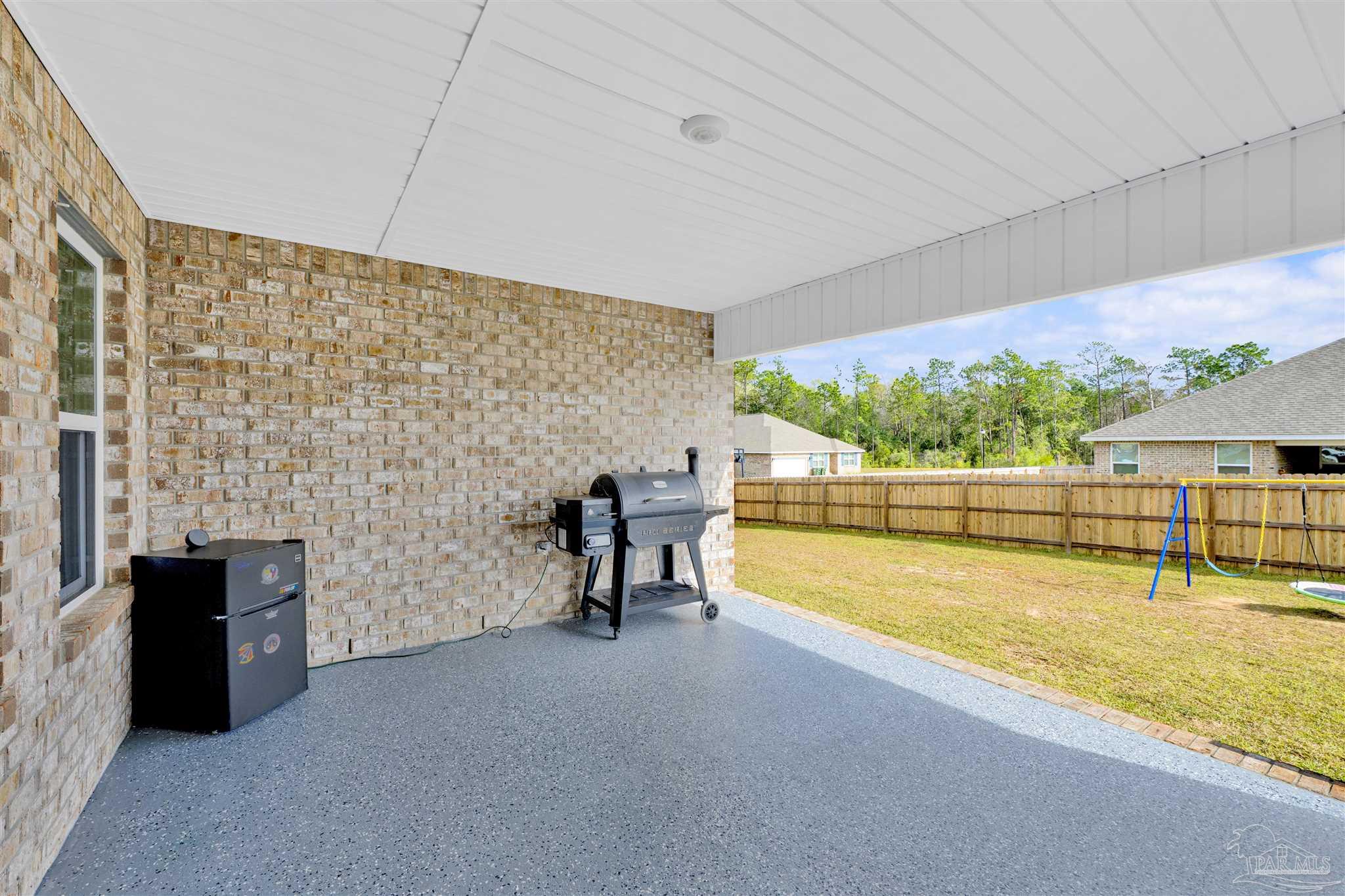 9747 MilleeLoop Loop Pensacola, FL 32526 - Photo 25 of 31 a view of a swimming pool