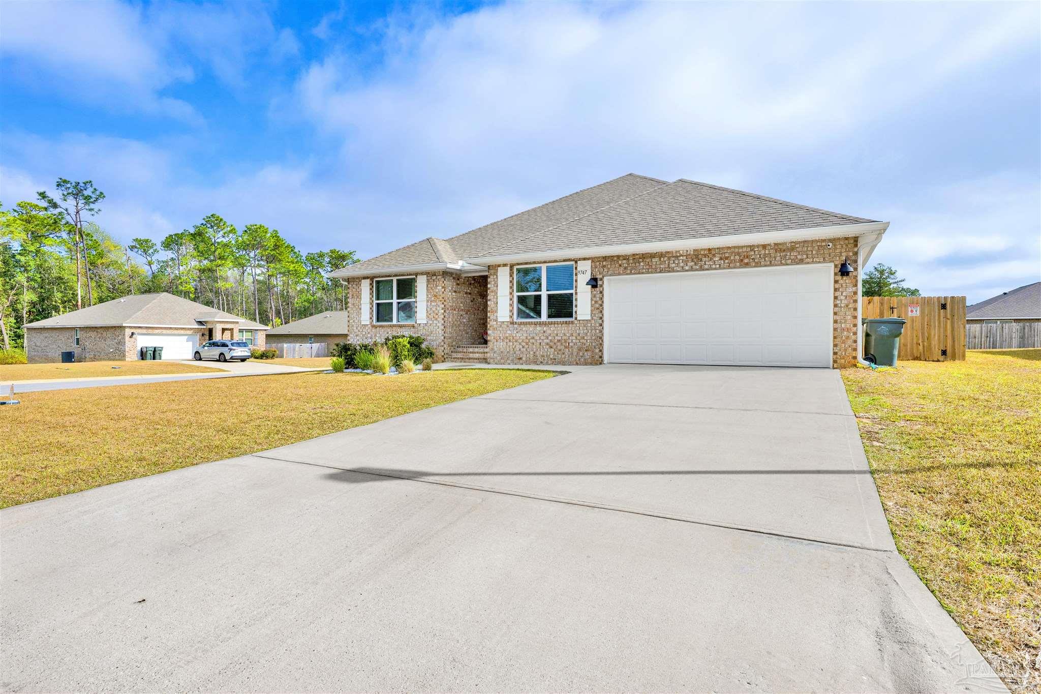 9747 MilleeLoop Loop Pensacola, FL 32526 - Photo 31 of 31 a view of house with yard and swimming pool