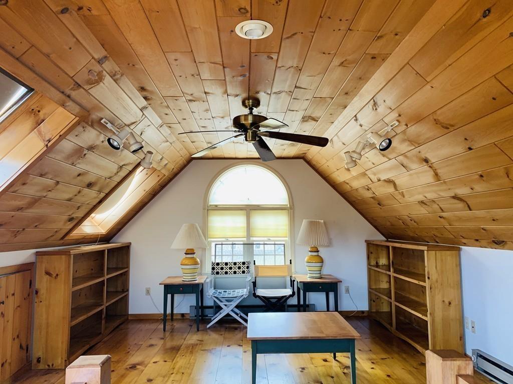 272 Lowell Road Groton, MA 01450 - Photo 16 of 21 a view of a livingroom with furniture window and wooden floor