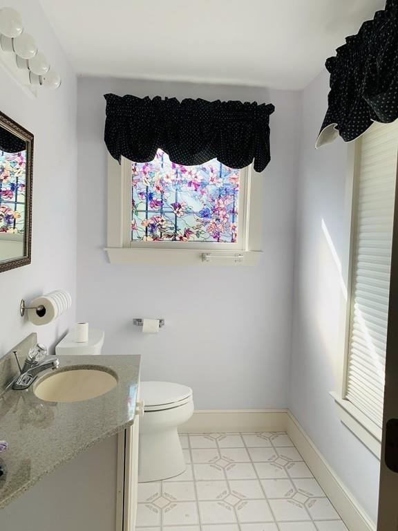 272 Lowell Road Groton, MA 01450 - Photo 20 of 21 a bathroom with a sink and a toilet