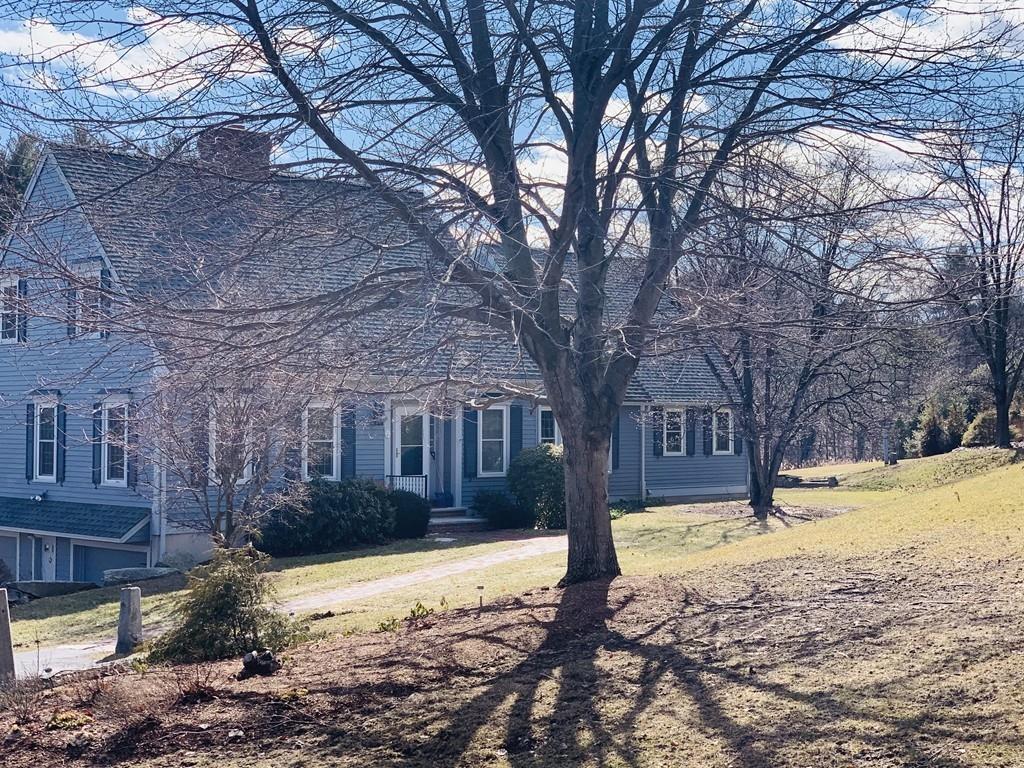 272 Lowell Road Groton, MA 01450 - Photo 3 of 21 a view of a yard with a tree