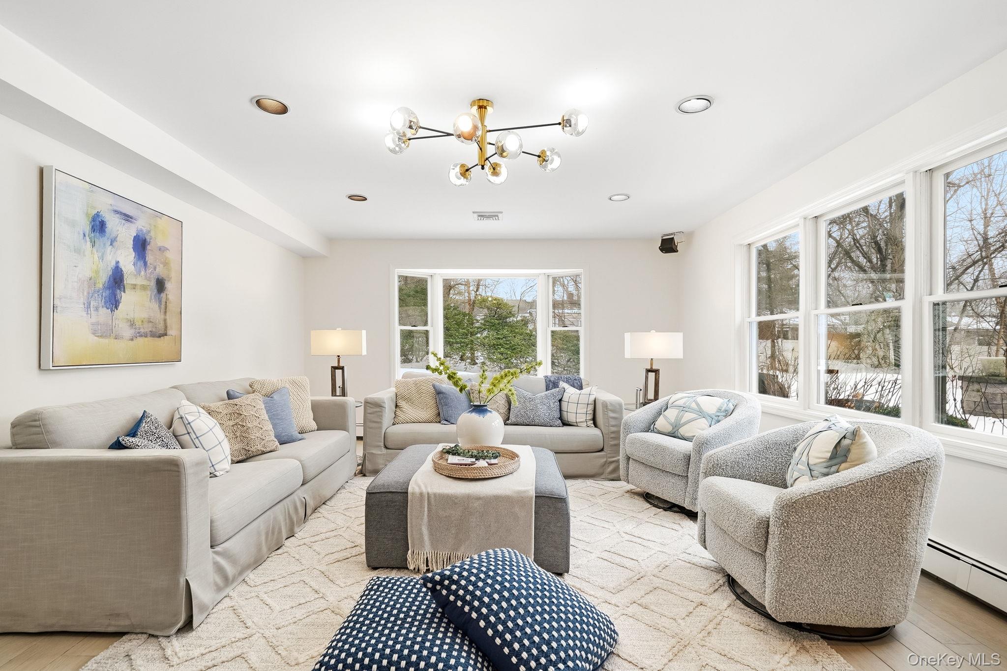 39 Lambert Lane New Rochelle, NY 10804 - Photo 12 of 30 Den with fireplace. Adjacent to kitchen