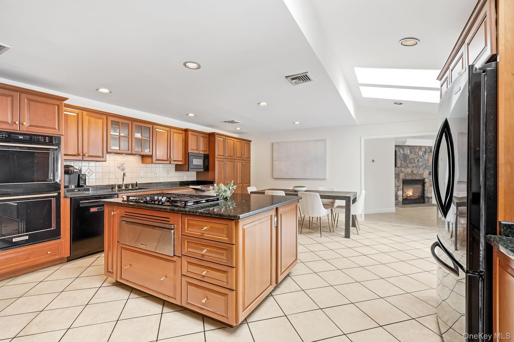 39 Lambert Lane New Rochelle, NY 10804 - Photo 10 of 30 Another kitchen view with 2 sinks, 2 dishwashers, 2 ovens. Warming drawer and microwave.