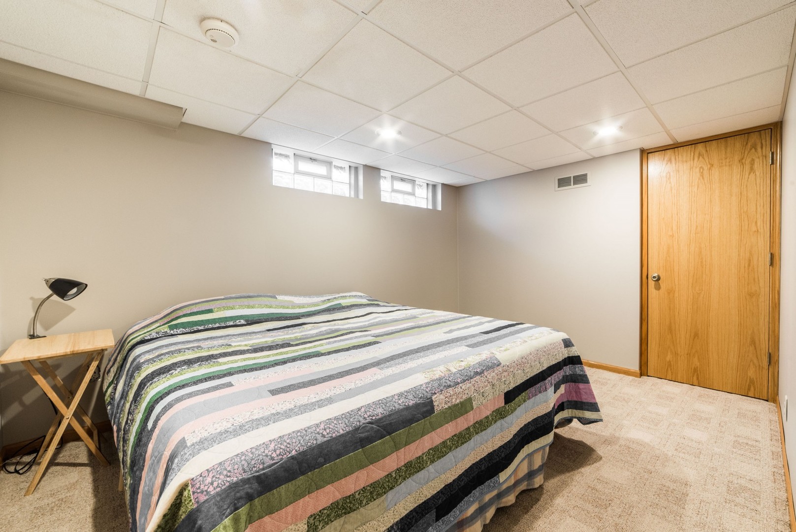13369 Ash Road Genoa, IL 60135 - Photo 15 of 26 a bedroom with a bed and a window