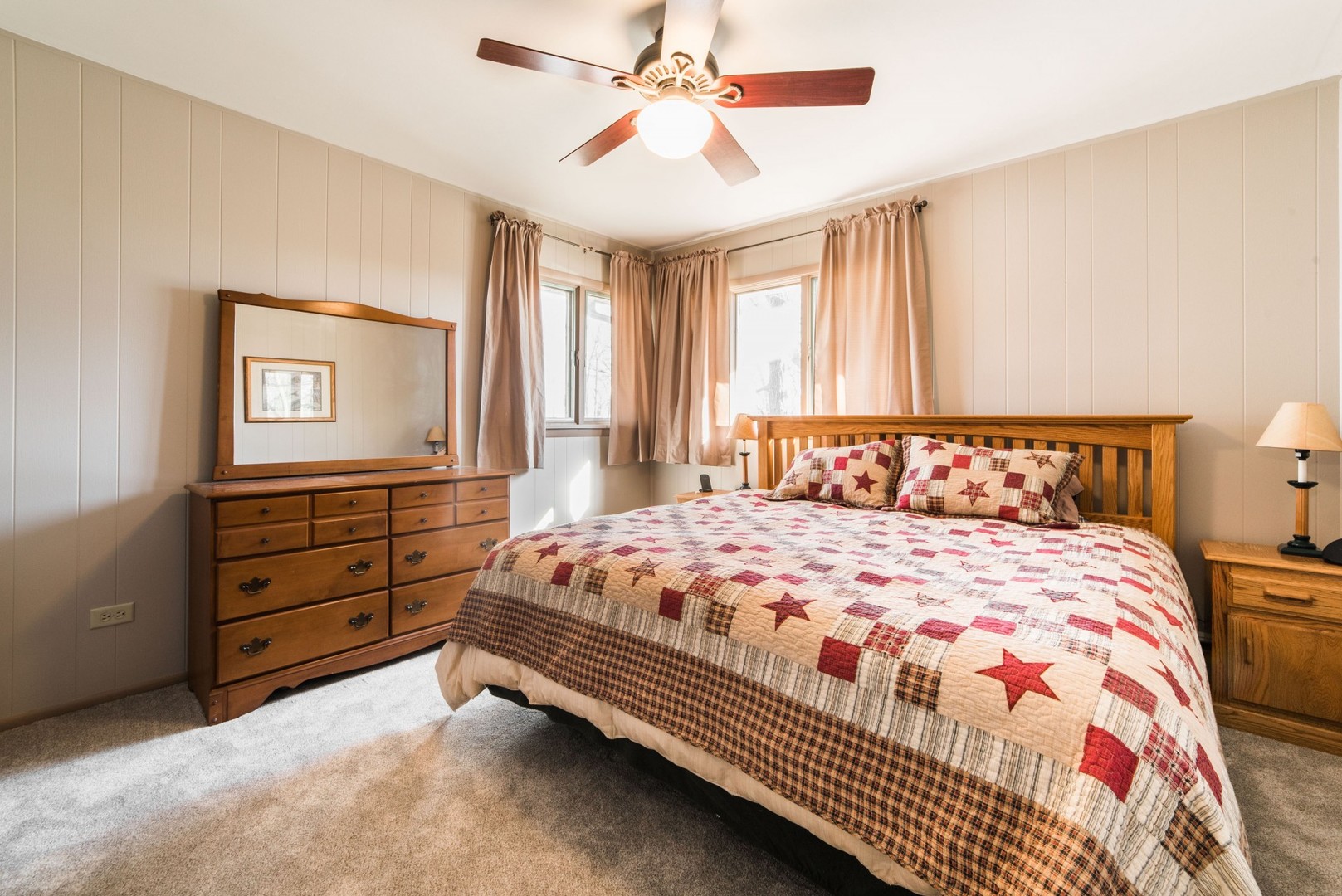 13369 Ash Road Genoa, IL 60135 - Photo 9 of 26 a bedroom with a bed and a dresser