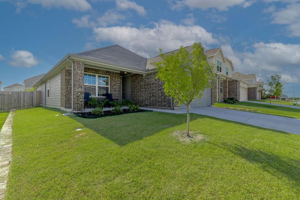 a house view with a garden space