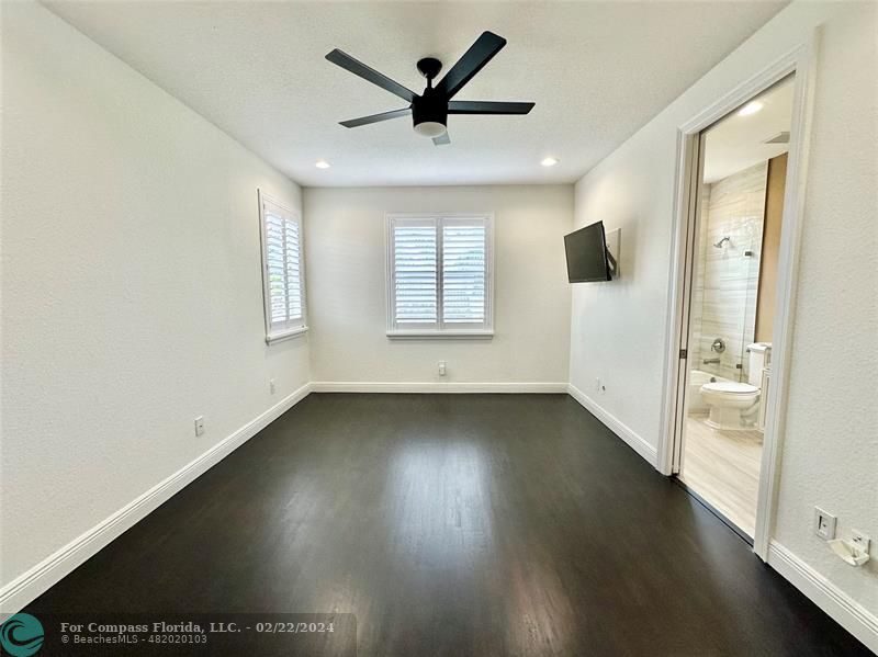 3395 Meadowbrook Way Davie, FL 33328 - Photo 20 of 27 an empty room with wooden floor and windows