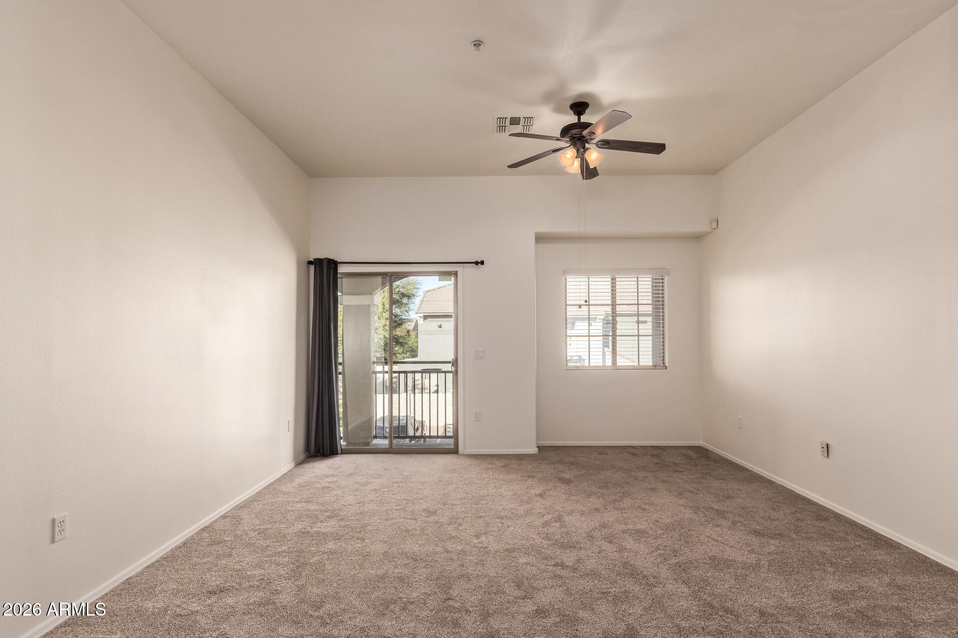 280 South Evergreen Road, Unit 1246 Tempe, AZ 85288 - Photo 15 of 25 wooden floor in an empty room with a window