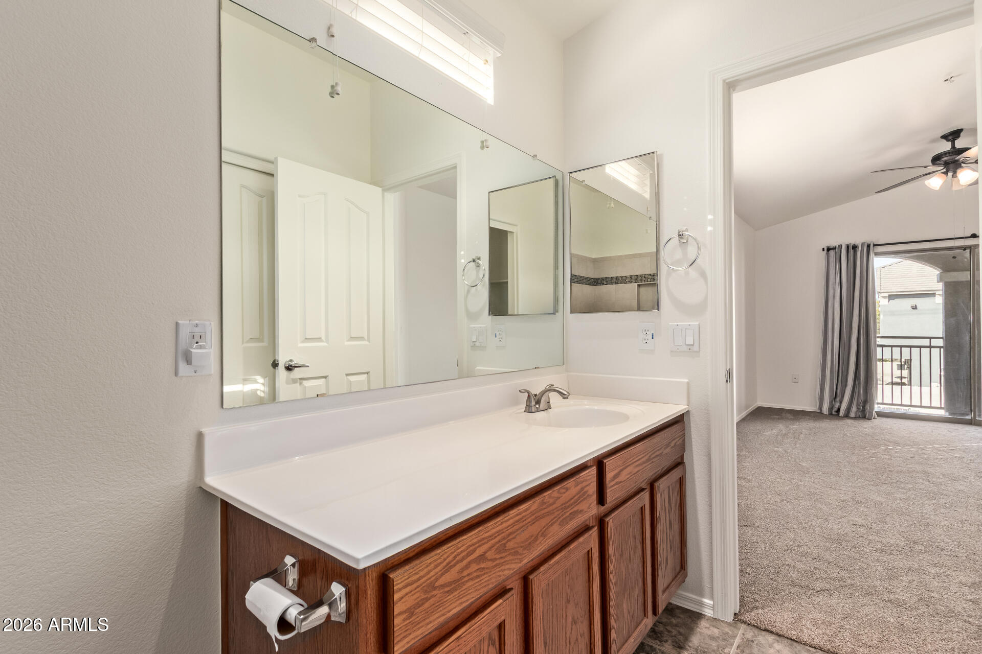 280 South Evergreen Road, Unit 1246 Tempe, AZ 85288 - Photo 20 of 25 a bathroom with a sink and a mirror
