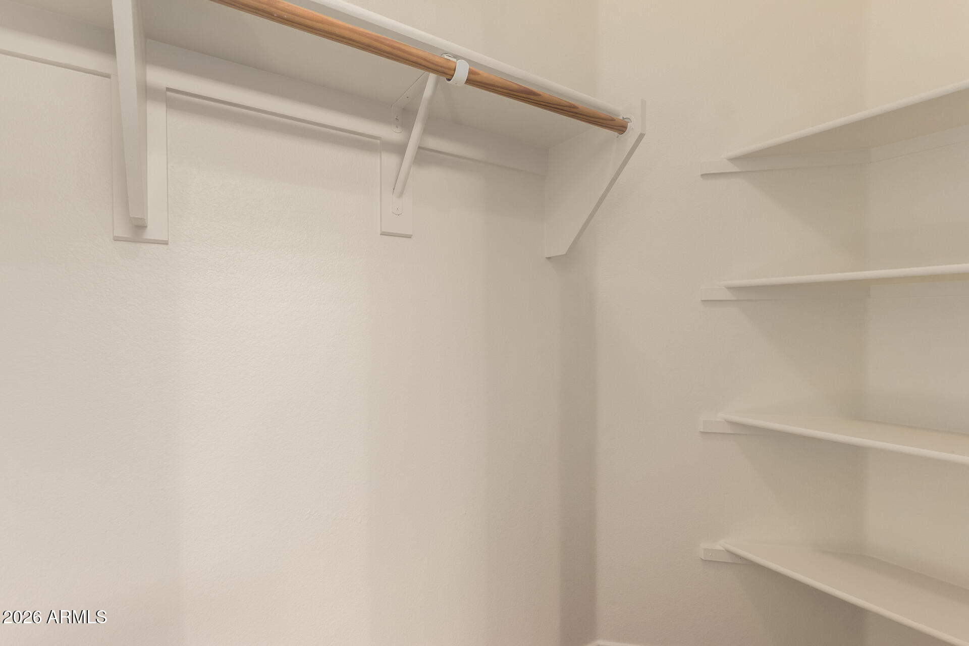 280 South Evergreen Road, Unit 1246 Tempe, AZ 85288 - Photo 22 of 25 a view of an empty walk in closet