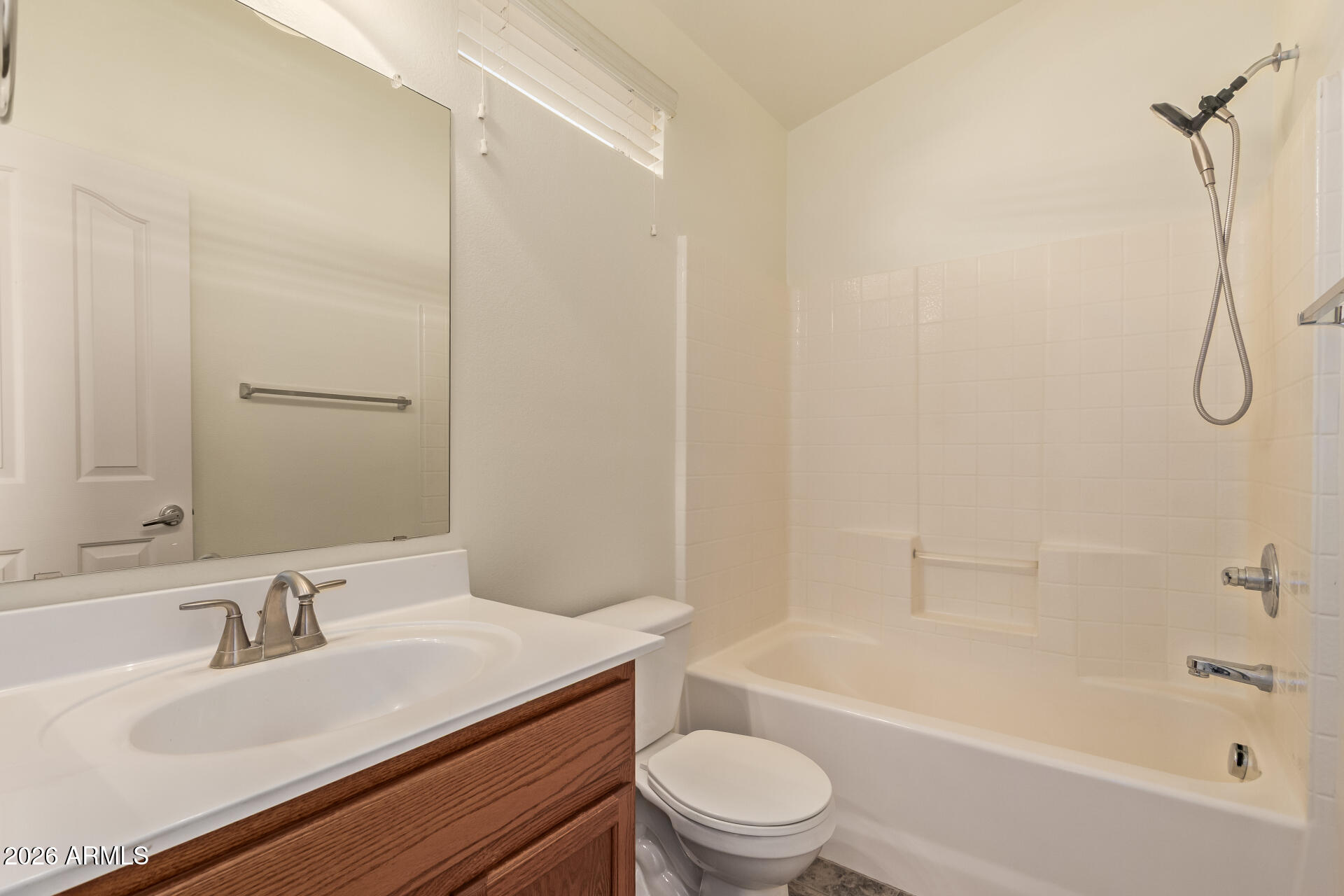 280 South Evergreen Road, Unit 1246 Tempe, AZ 85288 - Photo 25 of 25 a bathroom with a sink toilet vanity and shower