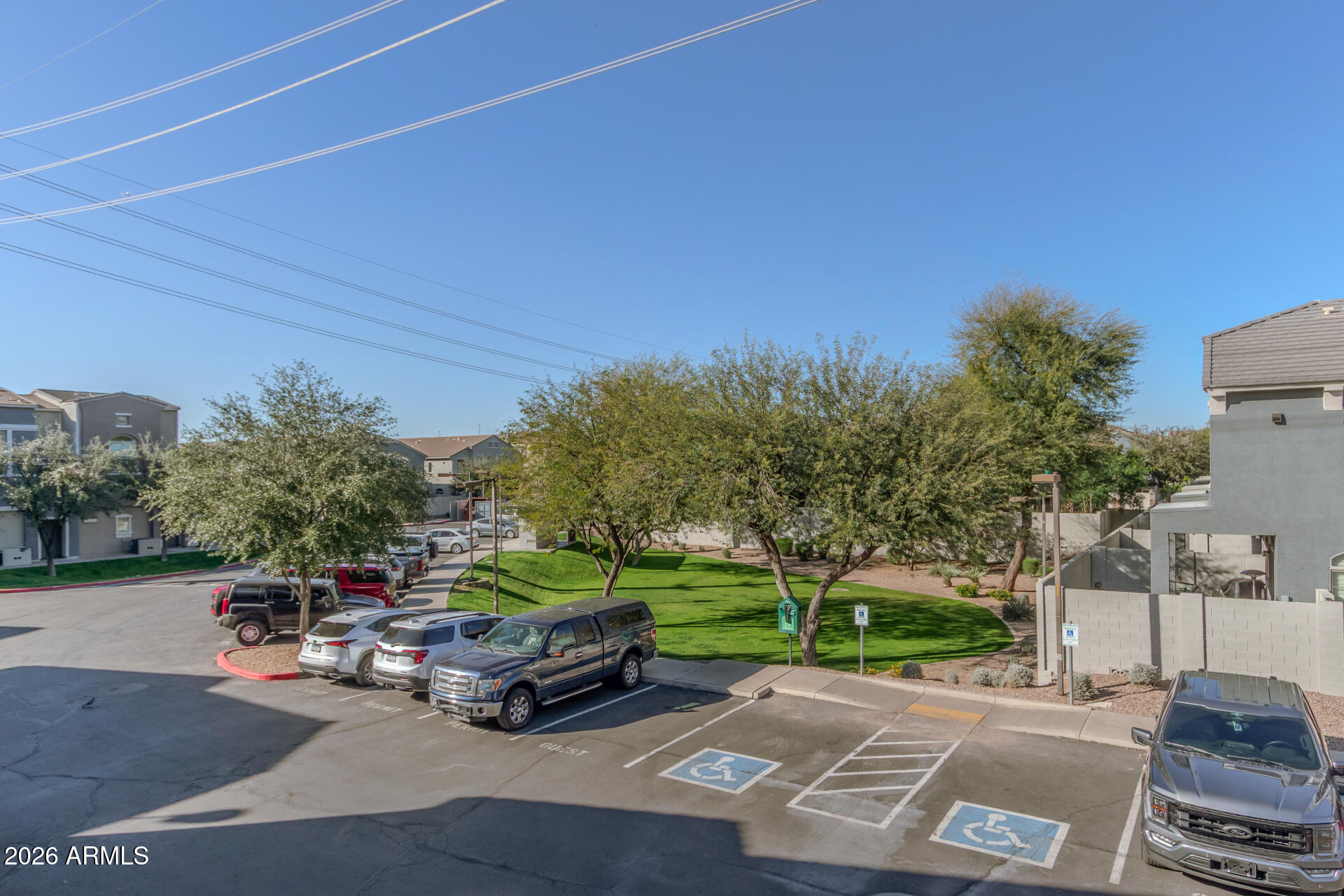 280 South Evergreen Road, Unit 1246 Tempe, AZ 85288 - Photo 3 of 25 a car parked on the side of the road