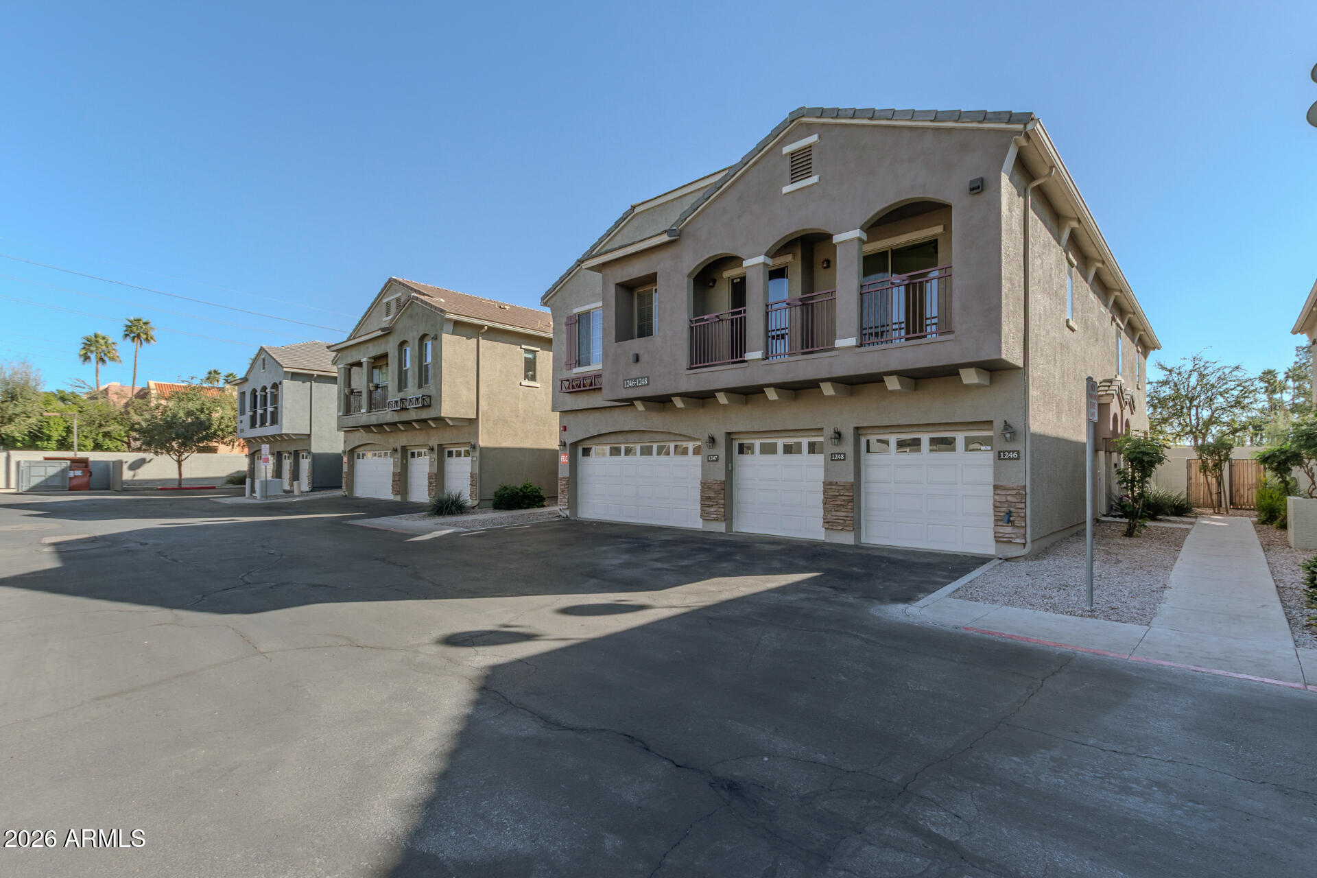 280 South Evergreen Road, Unit 1246 Tempe, AZ 85288 - Photo 4 of 25 a large building with a street