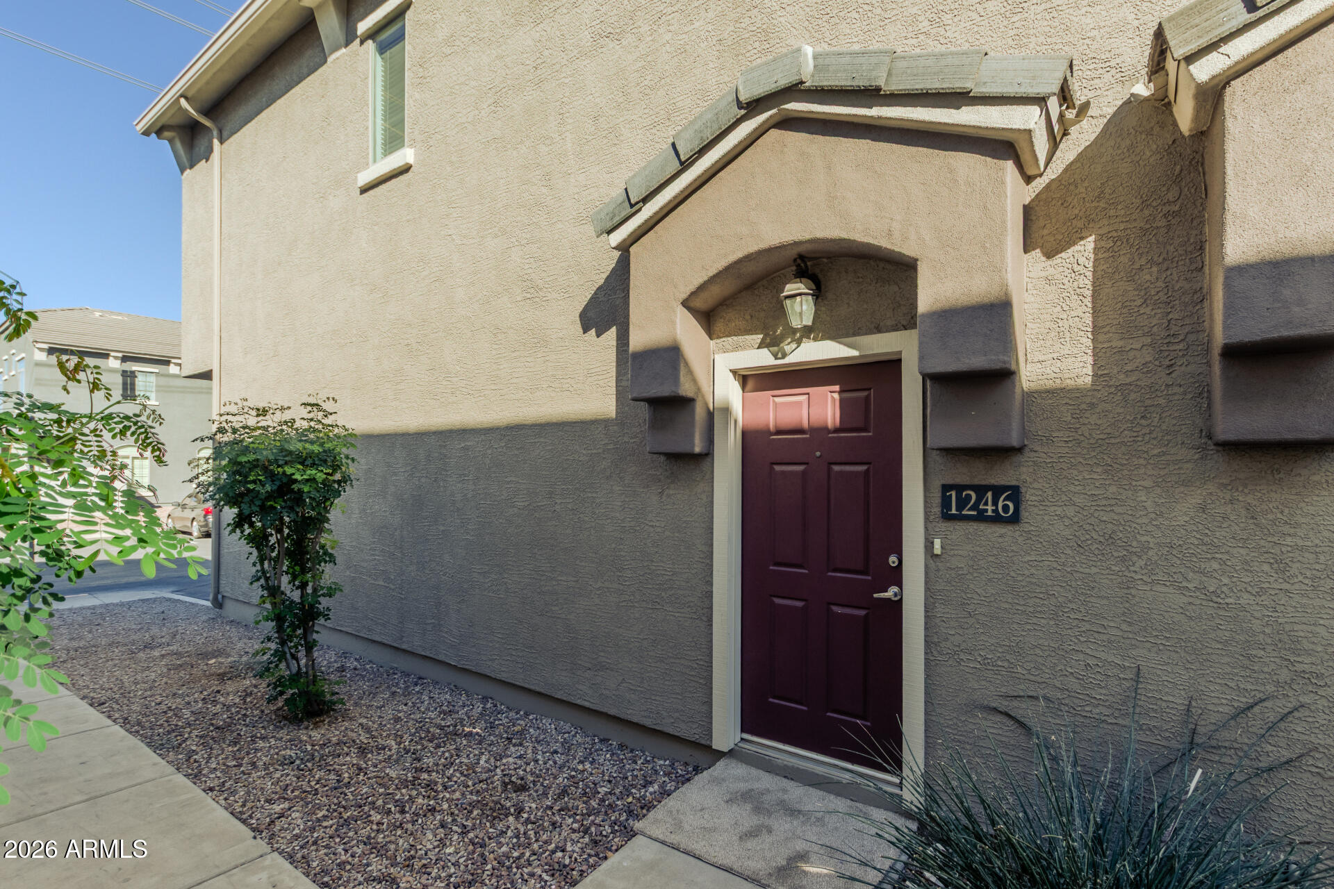 280 South Evergreen Road, Unit 1246 Tempe, AZ 85288 - Photo 6 of 25 a view of entryway with a garden