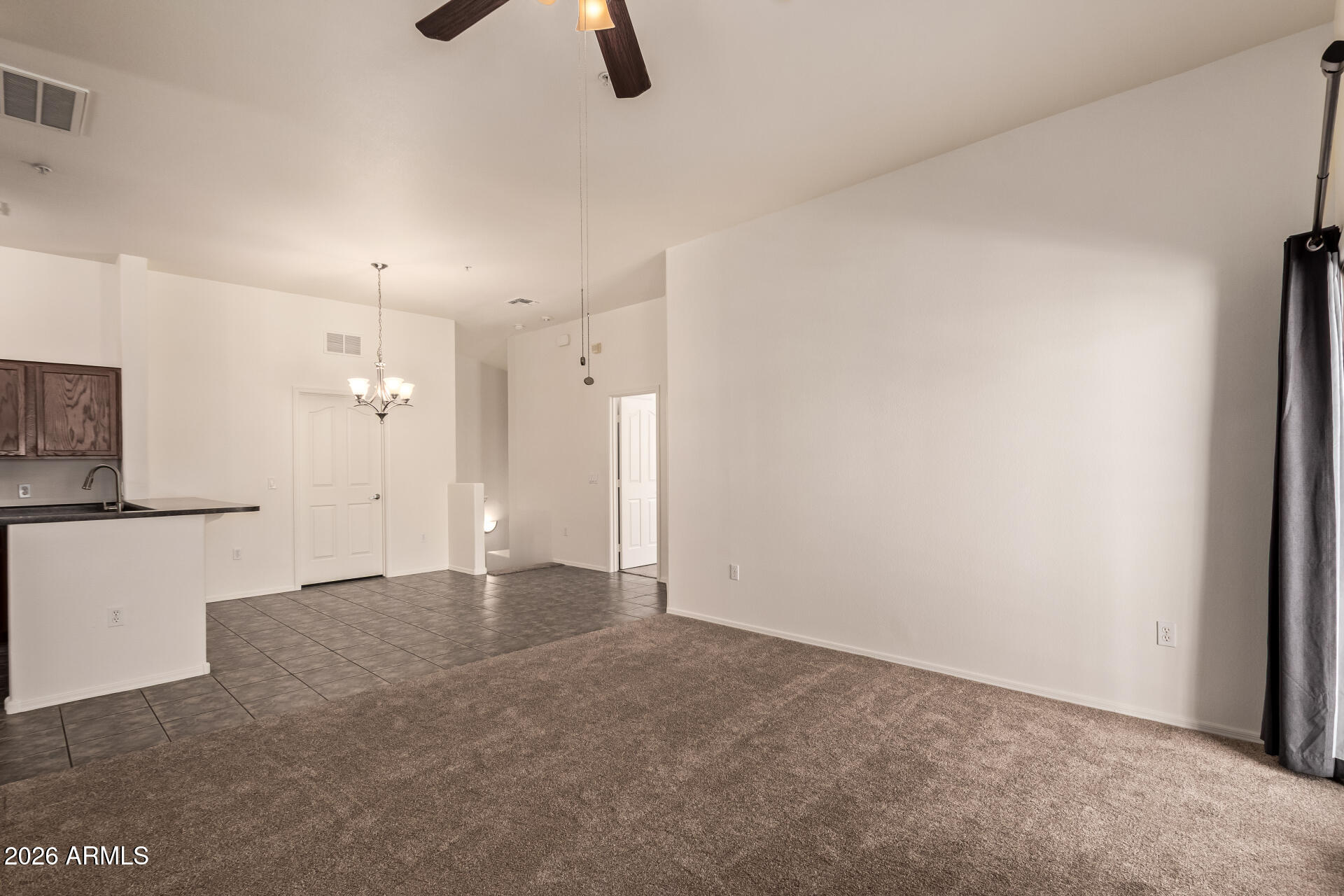 280 South Evergreen Road, Unit 1246 Tempe, AZ 85288 - Photo 8 of 25 a view of an empty room with a window