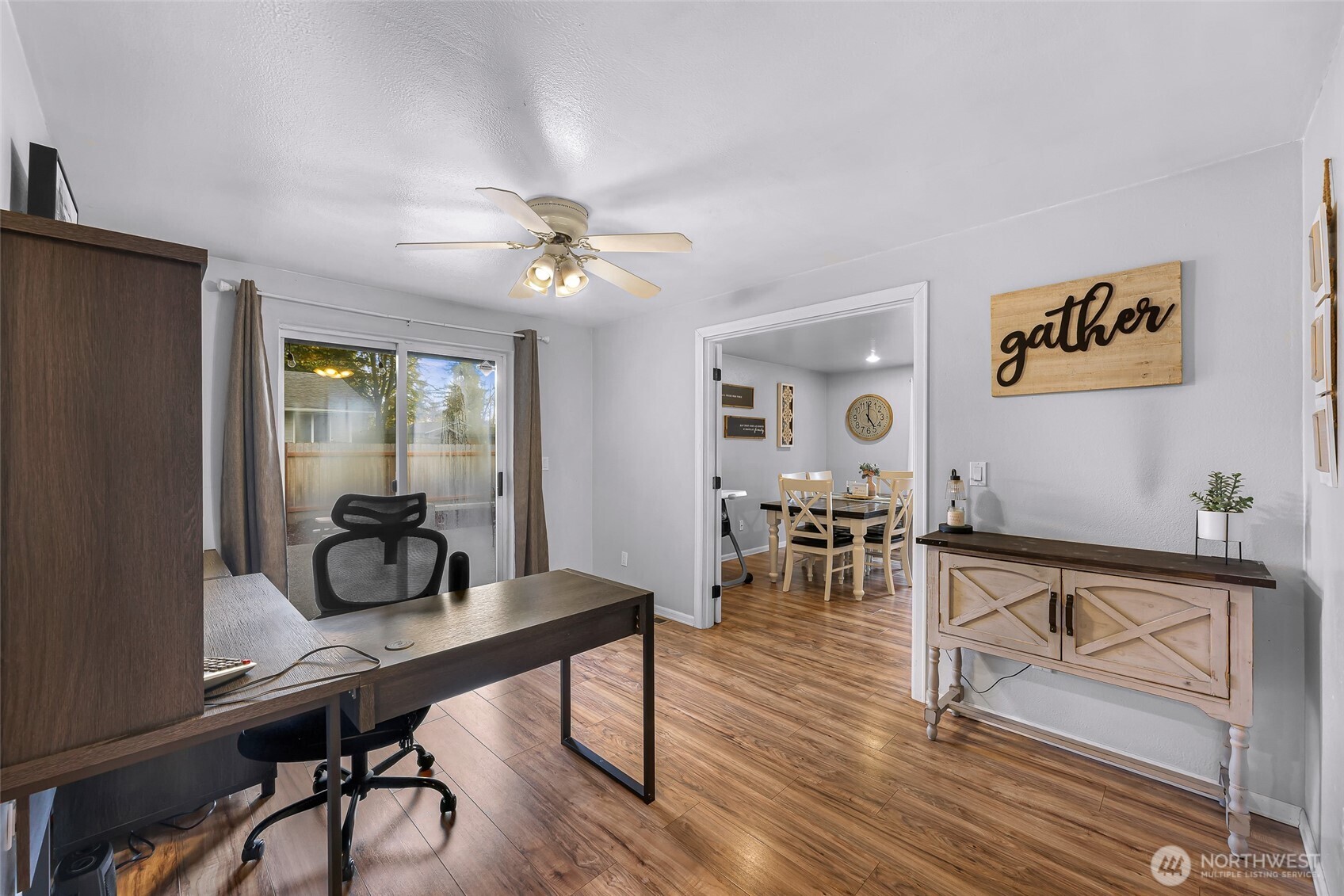 205 Cashmere Lane Everson, WA 98247 - Photo 19 of 40 a view of a dining room with furniture and wooden floor