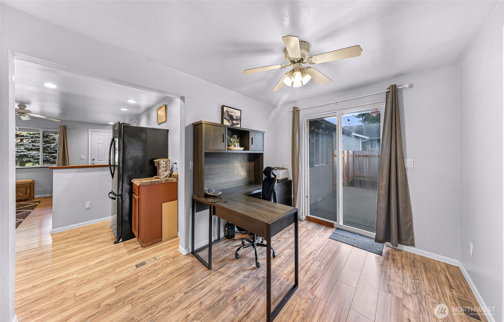 205 Cashmere Lane Everson, WA 98247 - Photo 21 of 40 a view of a workspace with furniture and wooden floor