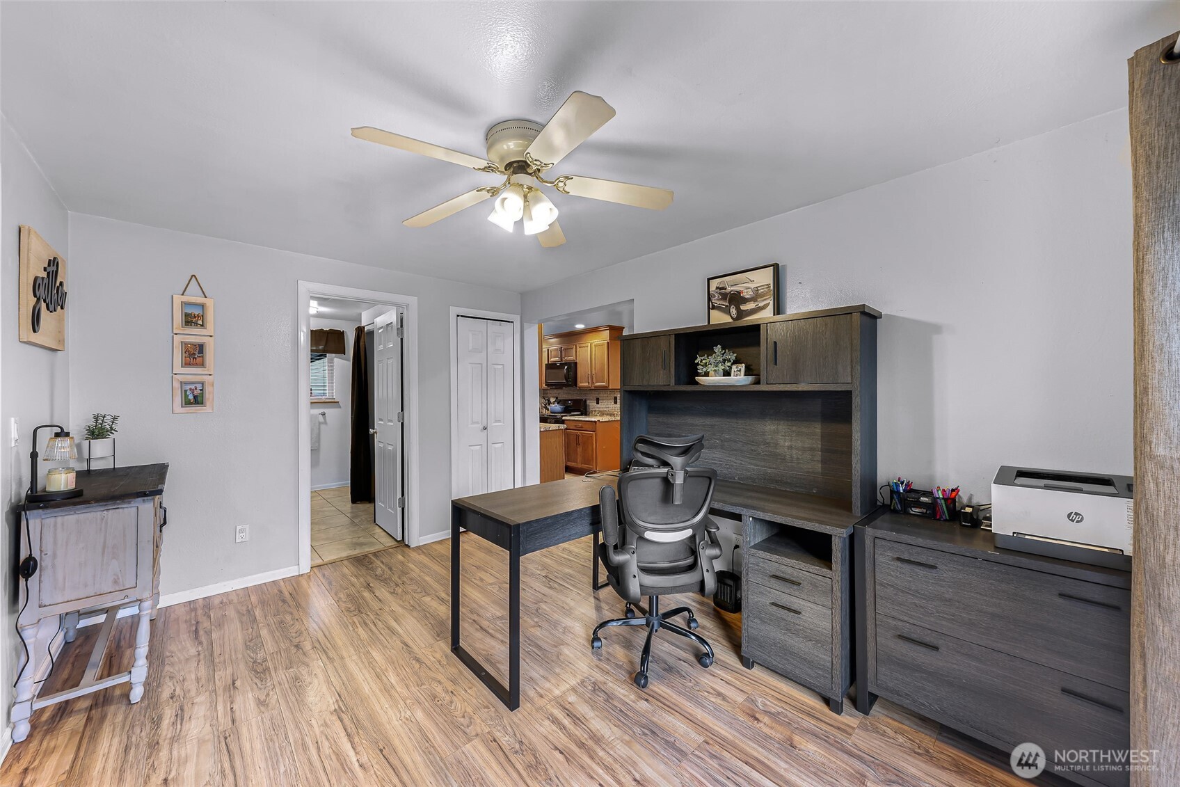 205 Cashmere Lane Everson, WA 98247 - Photo 22 of 40 a view of a workspace with furniture and wooden floor