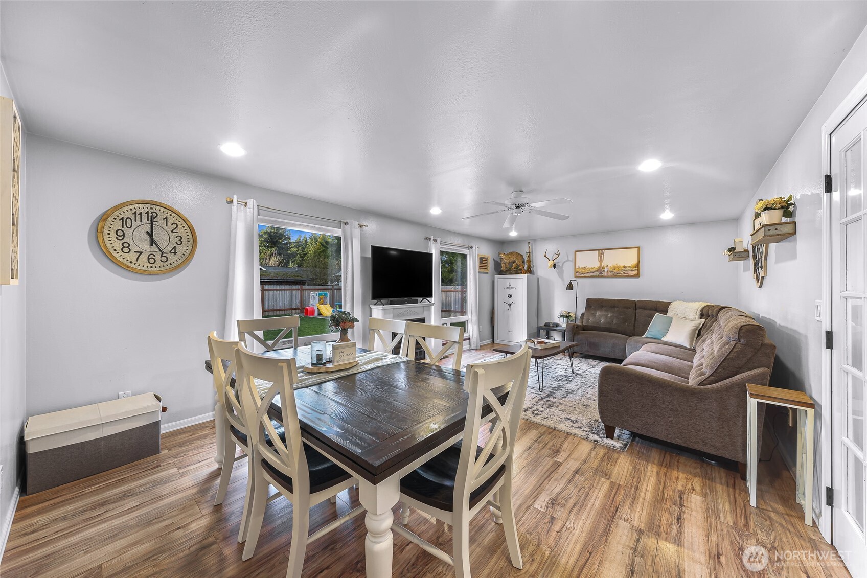 205 Cashmere Lane Everson, WA 98247 - Photo 27 of 40 a view of a dining room with furniture and wooden floor