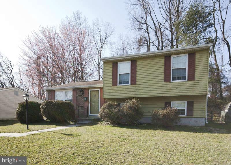 4715 Hawksbury Road Baltimore, MD 21208 - Photo 1 of 15 a view of a house with a yard