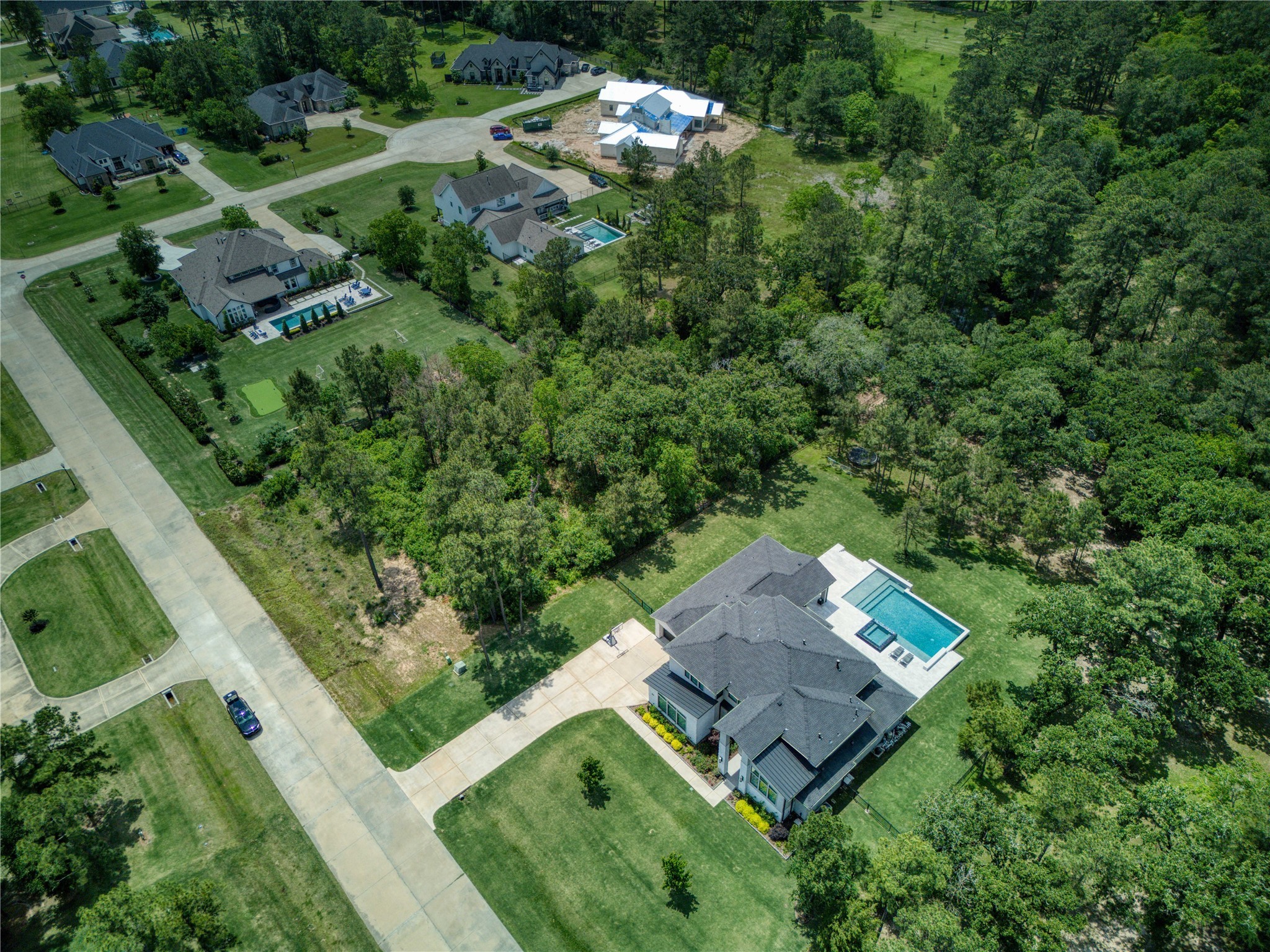 31111 Spring Lake Boulevard Tomball, TX 77375 - Photo 19 of 19 an aerial view of a house with a garden