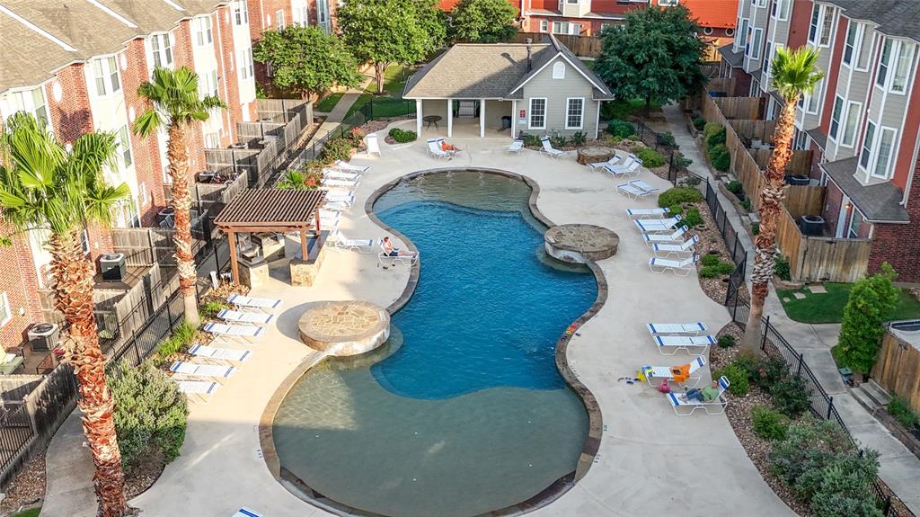1198 Jones-Butler Road, Unit 203 College Station, TX 77840 - Photo 17 of 18 an aerial view of a house with swimming pool and furniture