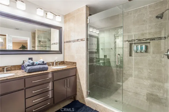 a view of a patio with table and chairs and potted plants