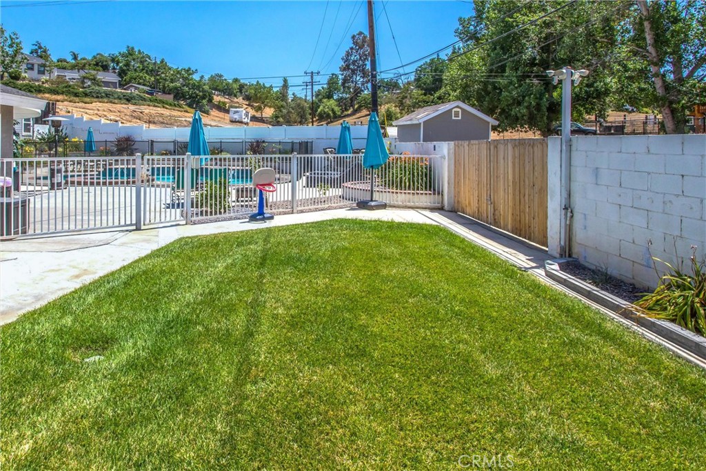 31607 Florida Street Redlands, CA 92373 - Photo 28 of 65 a view of backyard with a patio and outdoor seating