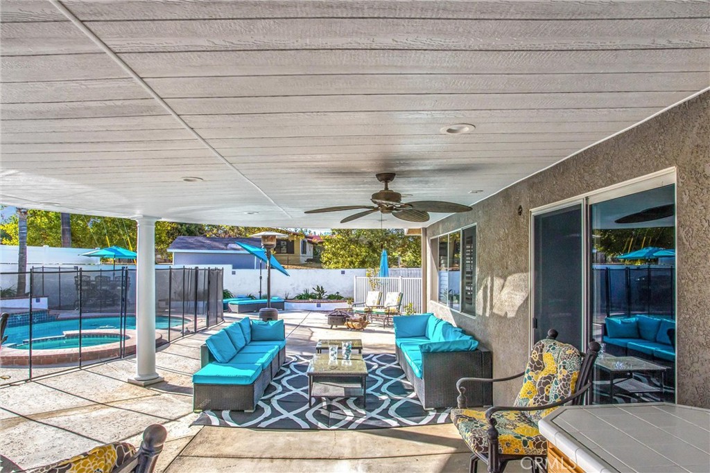 31607 Florida Street Redlands, CA 92373 - Photo 31 of 65 a view of a patio with table and chairs and potted plants