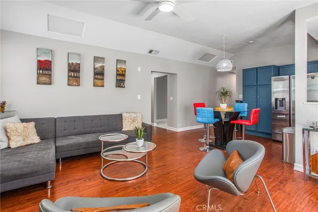 a bedroom with bed or couch and a flat screen tv