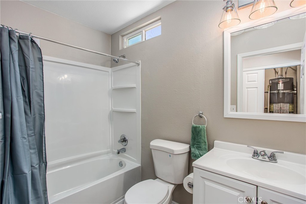 31607 Florida Street Redlands, CA 92373 - Photo 53 of 65 a bathroom with a sink toilet and shower