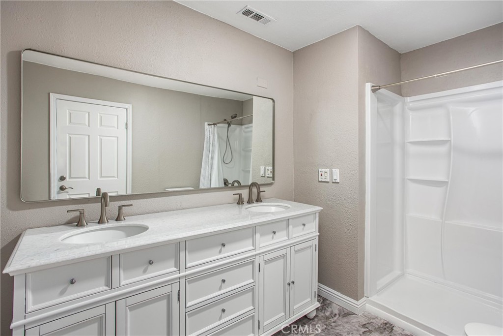 31607 Florida Street Redlands, CA 92373 - Photo 58 of 65 a bathroom with a sink and a mirror
