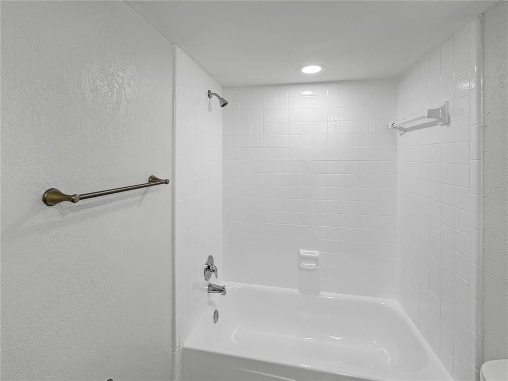 Undisclosed Address Seminole, FL 33777 - Photo 12 of 21 a bathroom with a bathtub